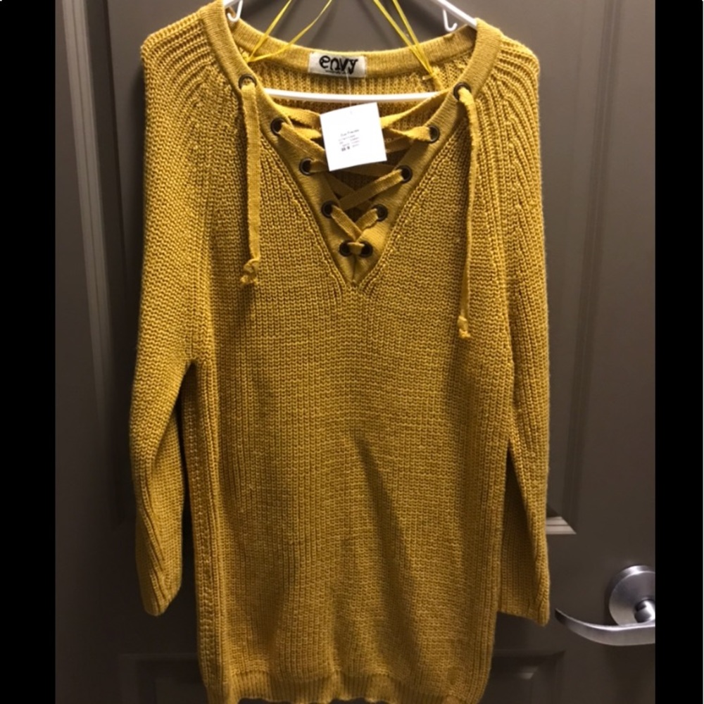 Brand new boutique sweater